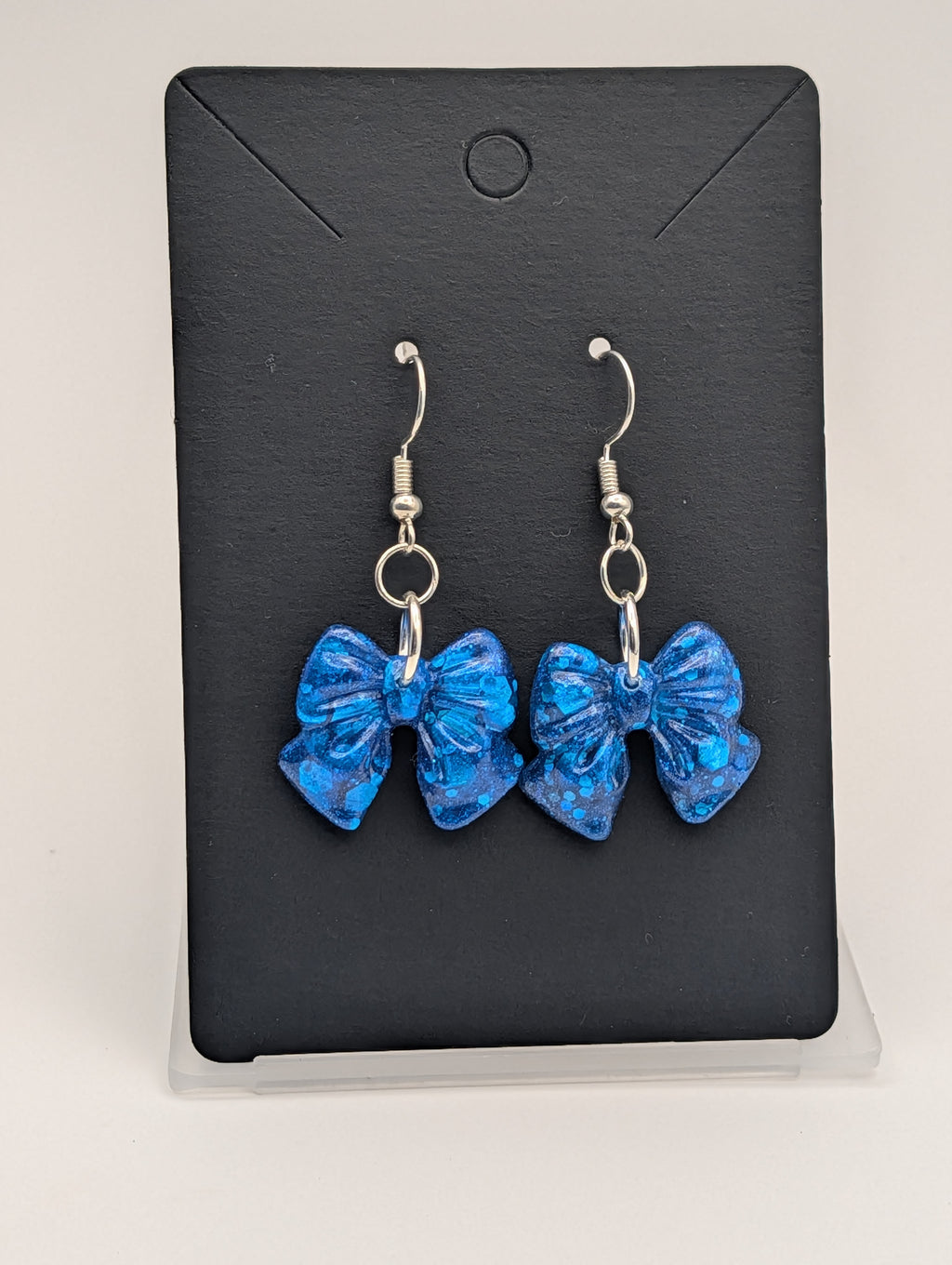 Cerulean Stardust Bows - Silver Plated Drop Earrings