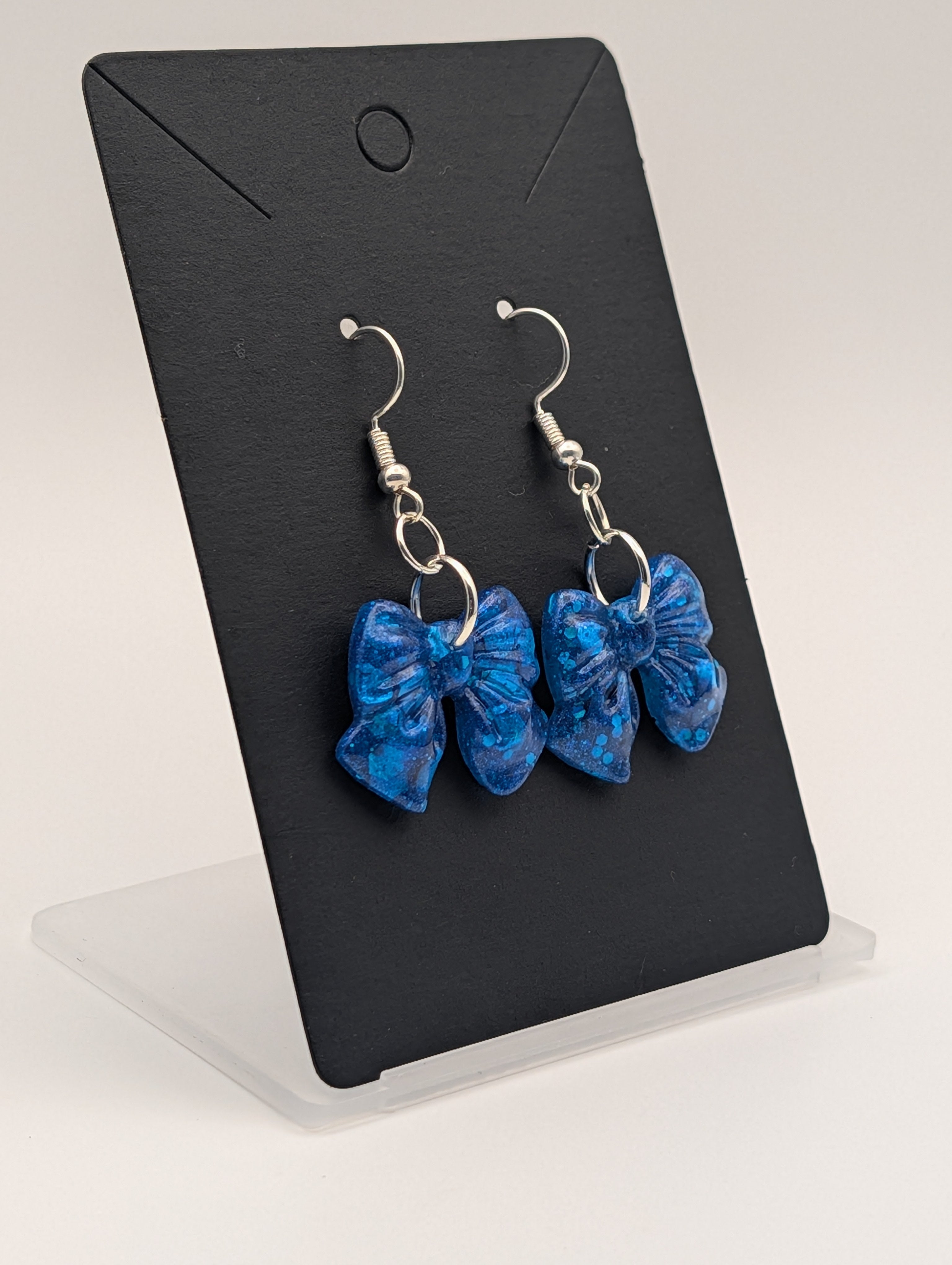 Cerulean Stardust Bows - Silver Plated Drop Earrings